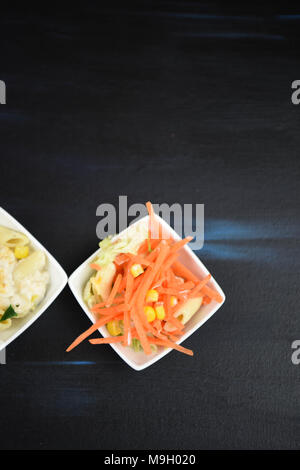 flat lay with dishes of pasta salad Stock Photo