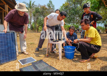 Tachileik, Myanmar - March 29 2017. Using solar panels to provide power for water pump in remote area of Myanmar Stock Photo