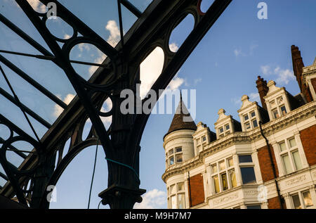 The Assembly House public house, seen from under the Kentish Town Canopy. Flowers Stall by Kentish Town Station, Kentish Town Road, Kentish Town NW5 Stock Photo