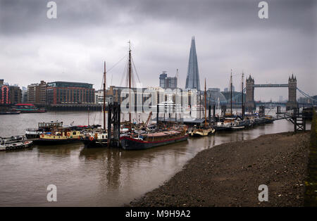 Tower Bridge and the River Thames view showing The Shard photographed from Wapping on north shore of the river. March 2018 Stock Photo