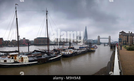 Tower Bridge and the River Thames view showing The Shard photographed from Wapping on north shore of the river. March 2018 Stock Photo