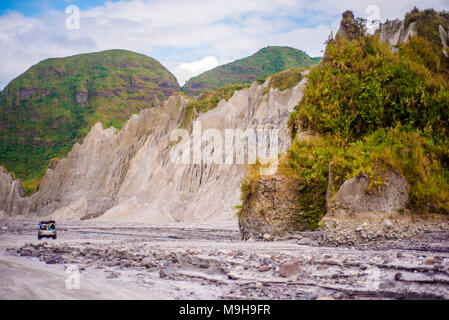 Navigating the rough terrain on the way to Mt. Pinatubo crater lake. Stock Photo