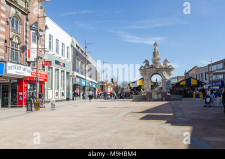 Shops and shoppers in Market Place, Dudley, West Midlands Stock Photo