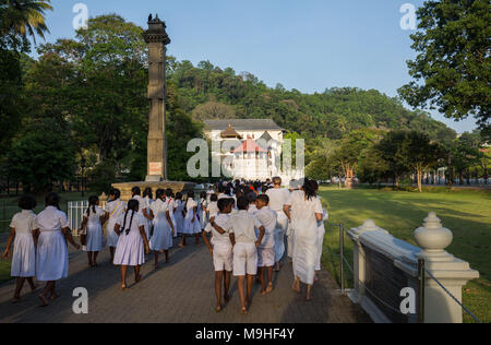 School students visiting Temple of the Tooth, Kandy, Sri Lanka, Asia. Stock Photo