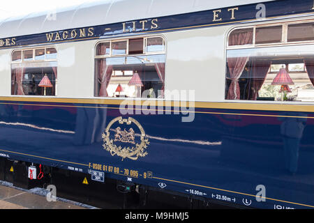 The Venice Simplon Orient-Express  luxury train in Venezia S Lucia station, Venice, Veneto,  Italy with close up detail of a sleeping carriage Stock Photo
