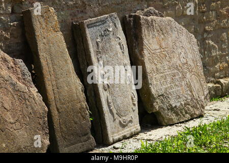broken gravestone in the old cemetery close to Stock Photo
