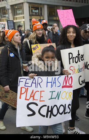 NYC, March 24, 2018: Students and many others demonstrated in the 'March For Our Lives' march all over the USA for an end to the slaughter of American students in schools and gun related deaths generally in the US. Nearly 200,000 marched in New York City. Stock Photo