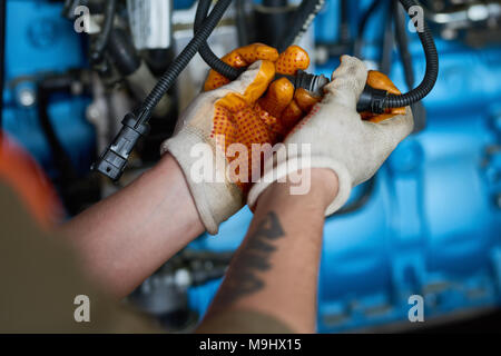Electrician Connecting Cables Stock Photo