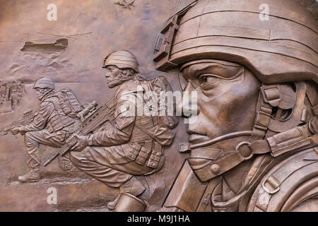 England, London, Westminster, Victoria Embankment Gardens, Iraq and Afghanistan War Memorial, Plaque depicting British Army in Action Stock Photo