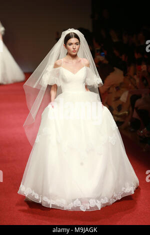 Beijing, China. 26th Mar, 2018. A model on the catwalk during the Lanyu wedding dress show at China Fashion Week in Beijing. Credit: SIPA Asia/ZUMA Wire/Alamy Live News Stock Photo