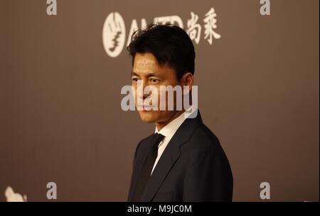Hong Kong, CHINA. 26th Mar, 2018. South Korean actor Jung Woo-sung pose for the medias at annual AMFAR fundraising gala in Hong Kong.Mar-26, 2018 Hong Kong.ZUMA/Liau Chung Ren Credit: Liau Chung Ren/ZUMA Wire/Alamy Live News Stock Photo