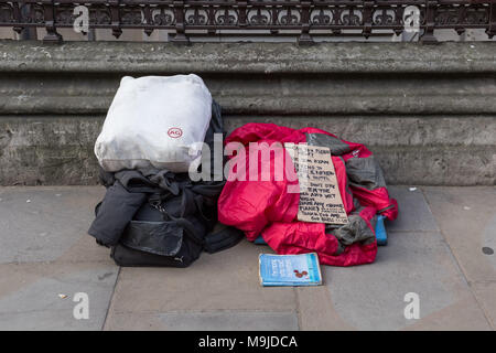London, UK. 26th March, 2018. A rough sleeper’s bedding and personal belongings seen during the day near Piccadilly. The number of people sleeping rough in England has risen for the sixth year in a row, according to the latest official figures. Credit: Guy Corbishley/Alamy Live News Stock Photo