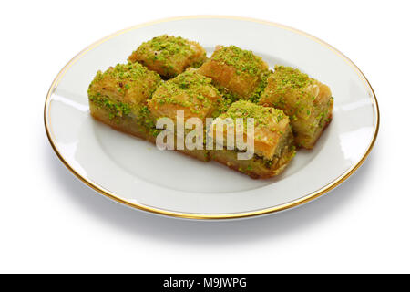 pistachio baklava, fistikli baklava, turkish traditional dessert isolated on white background Stock Photo