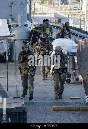 A Marine with 3rd Explosive Ordnance Company puts together a mock ...