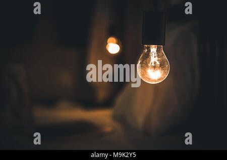 Vitange retro light in Dark blur Bed room. Stock Photo