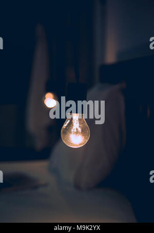 Vitange retro light in Dark blur Bed room Stock Photo
