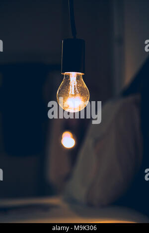 Vitange retro light in Dark blur Bed room Stock Photo
