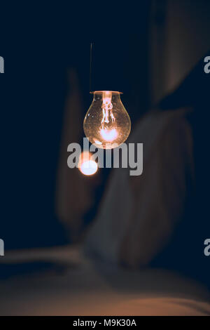 Vitange retro light in Dark blur Bed room Stock Photo