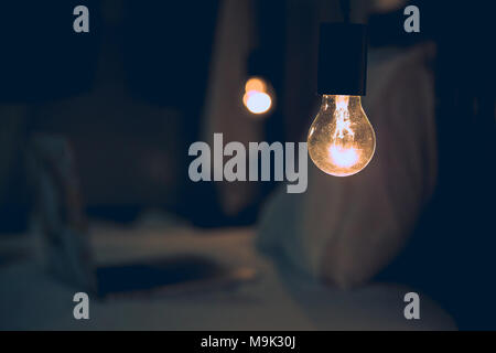 Vitange retro light in Dark blur Bed room Stock Photo