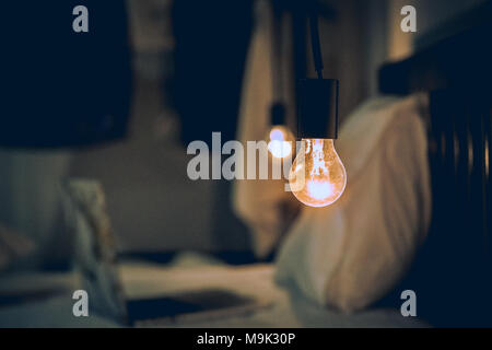 Vitange retro light in Dark blur Bed room Stock Photo