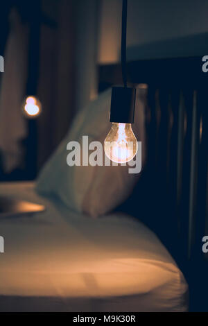 Vitange retro light in Dark blur Bed room Stock Photo