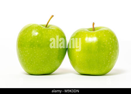 Two fresh green apples isolated on white background Stock Photo