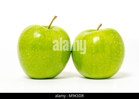 Two fresh green apples isolated on white background Stock Photo
