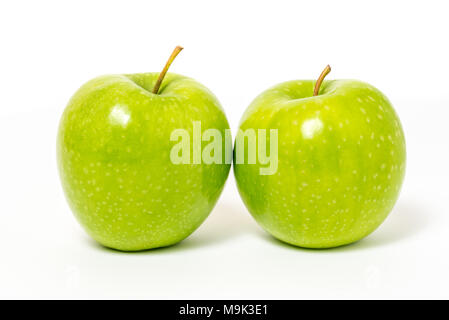 Two fresh green apples isolated on white background Stock Photo