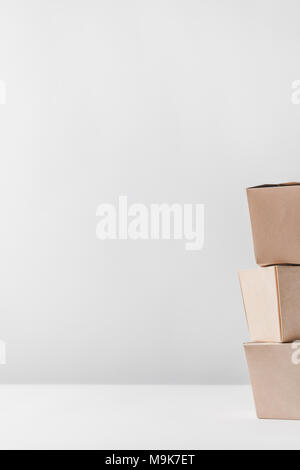three noodles boxes on white tabletop Stock Photo