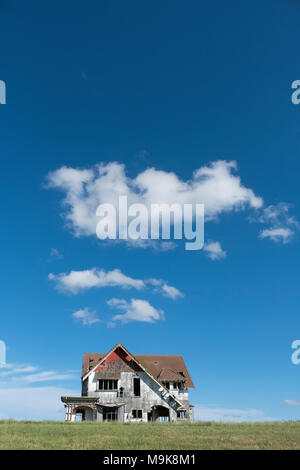 abandoned derelict house on a hill in New Zealand Stock Photo