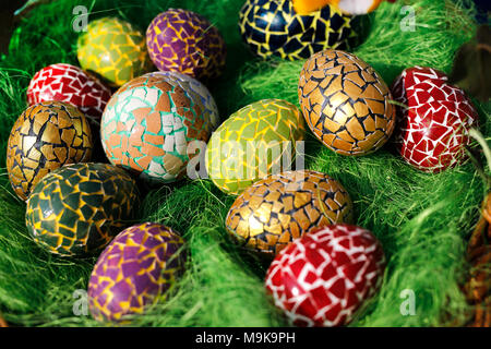 Painted Easter eggs covered with colorful pieces of eggshell. Creative and innovative. Stock Photo