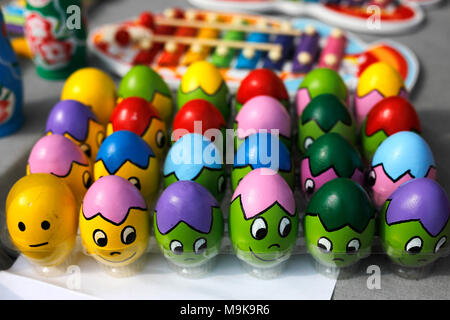 Funny Easter eggs. Colorful painted eggs with funny faces. Stock Photo