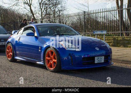 2002 (52) blue Nissan 350 Z 3500cc petrol coupe at the North-West Supercar event as cars and tourists arrive in the coastal resort on a warm spring day. SuperCars are bumper to bumper on the seafront esplanade as classic & vintage car enthusiasts enjoy a motoring day out. Stock Photo