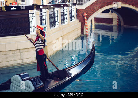 Macau, China - September 15, 2015 : Venetian gondola on canal Stock Photo