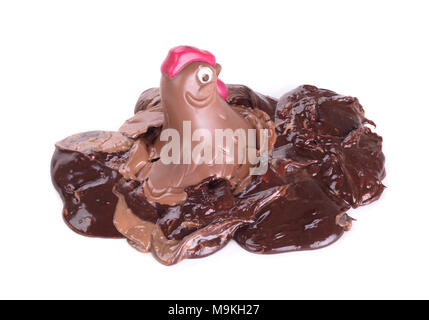 Melting chocolate easter chicken - Isolated on white background Stock Photo