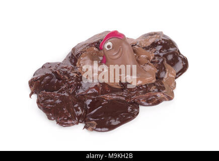 Melting chocolate easter chicken - Isolated on white background Stock Photo