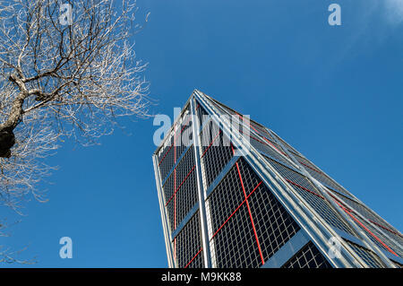 Madrid, Spain - March 26, 2018: Low angle view of KIO Tower office building in Madrid agaisnt blue sky Stock Photo