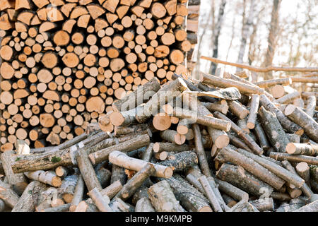 Firewood for the winter, stacks of firewood, pile of firewood. Preparation for winter Stock Photo