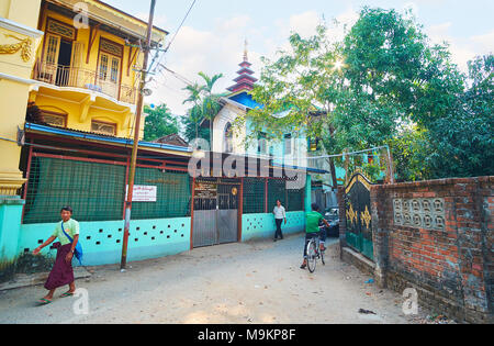YANGON, MYANMAR - FEBRUARY 14, 2018: The quarter of 66 Thayet Taw Buddhist Monasteries, located in vicinity of Lanmadaw street in Chinatown, on Februa Stock Photo