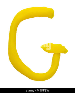 Plasticine letter G isolated on a white background. Stock Photo