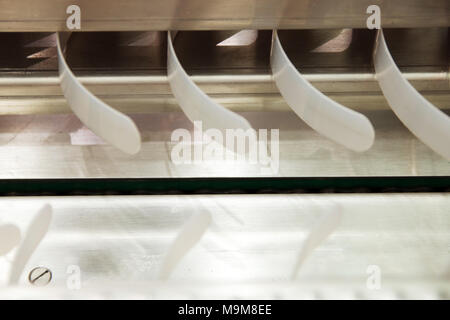 close-up empty conveyor belt for bread factory. Stock Photo