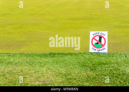 Keep off the grass sign warning sign public notice warning notice Stock Photo