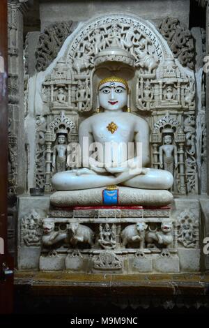 Sculpture of Mahavira or Varshamana in the elaborately carved Jain Temple Jaisalmer Rajashan India Stock Photo