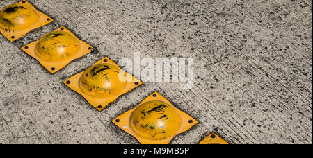 speed bump on asphalt road closeup - speed bump on street Stock Photo