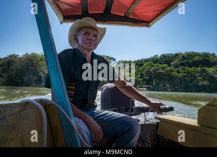 Portrait of a old man, in a cowboy hat with feather, with beard, front view  - dark isolated silhouette Stock Photo - Alamy