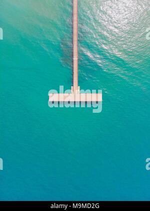 High above a pier in Latsi Cyprus, within the beautiful blue waters of the Mediterranean Stock Photo