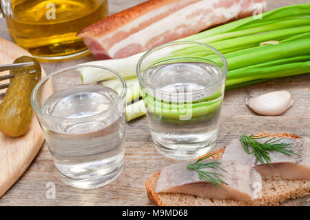 Two glasses of vodka and a snack Stock Photo