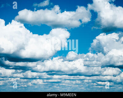 Beautiful, fluffy clouds, floating in the sky on a spring day Stock Photo