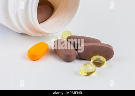 Colorful of oral medications on White Background, close up. Stock Photo