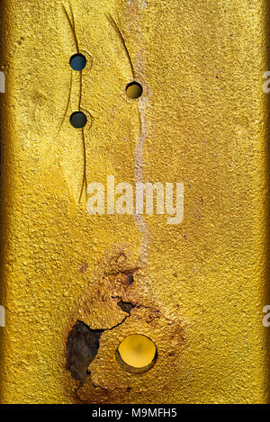 Golden colored rusty metal detail used for construction Stock Photo